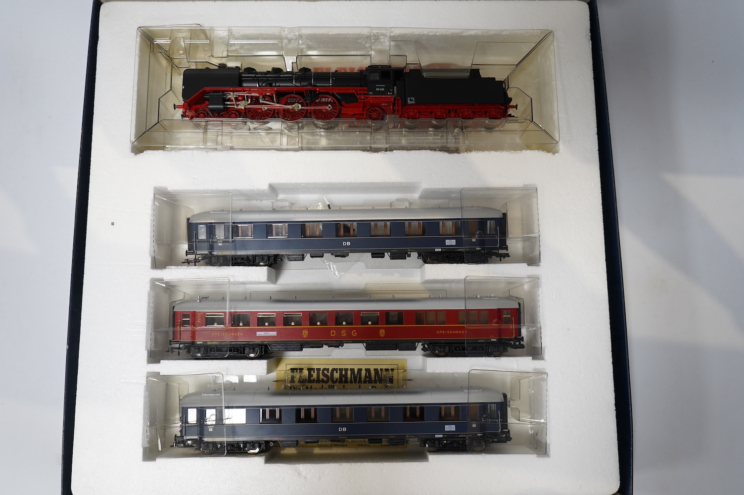 Two boxed Fleischmann HO gauge German passenger train sets, both comprising of a tender locomotive and bogie coaches (4885 and 4894), together with a Liliput 4-6-2 locomotive (4001) and a DR Rhinegold coach set (820), (4